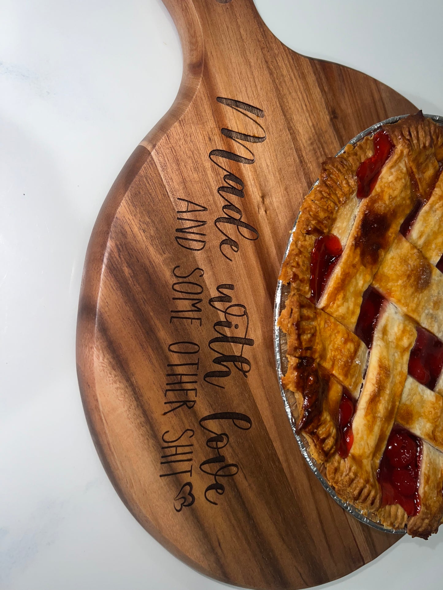 “Made with love and some other shit” cutting board